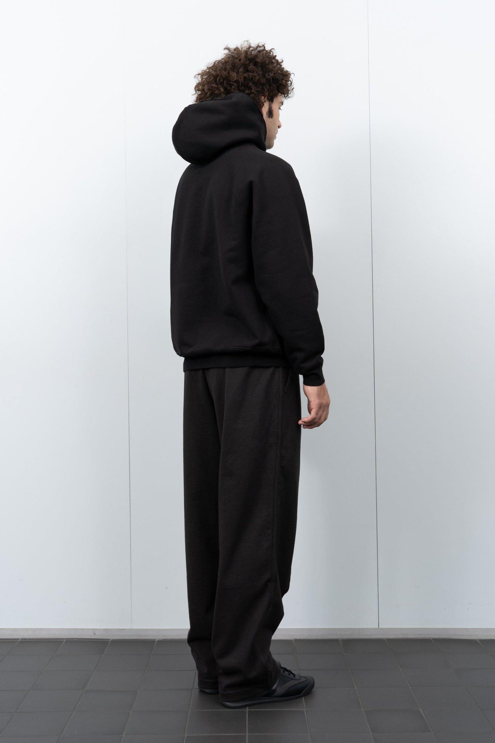 super weighted hoodie black back view minimal streetwear hoodie